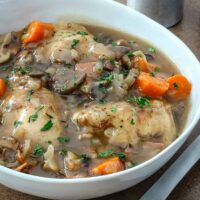 White wine braised chicken thighs cooked in the Instant Pot pressure cooker.