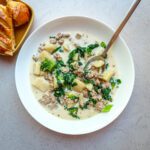 a bowl of delicious zuppa toscana from the instant pot