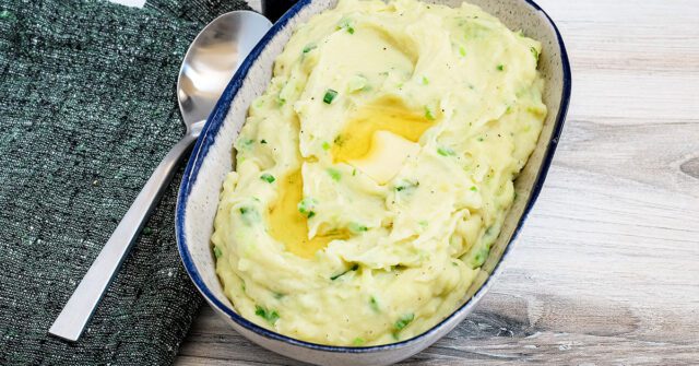Irish champ potatoes with green onions and butter.