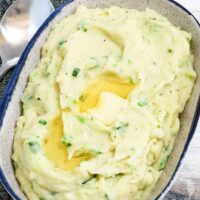 Irish champ potatoes with green onions and butter.