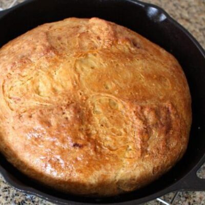 irish soda bread baked in a cast iron pan