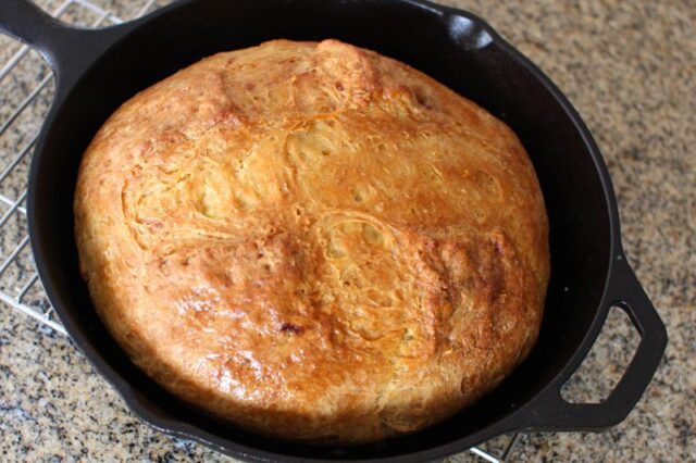 irish soda bread baked in a cast iron pan