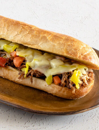 italian beef sandwich with provolone cheese