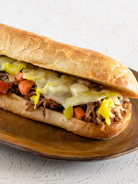 italian beef sandwich with provolone cheese