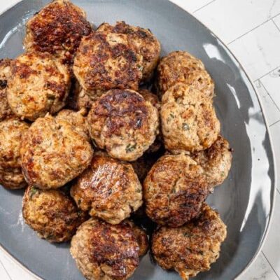 A serving plate with Italian meatballs.