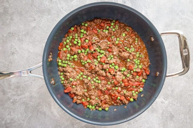 Keema matar prep with peas, tomatoes, and ground beef.