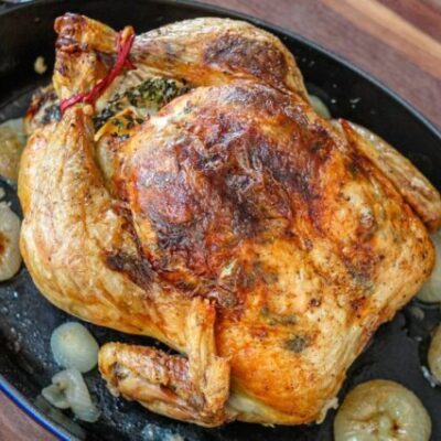 A perfectly roasted Sunday dinner chicken with lemon and herbs