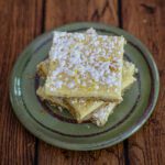stack of lemon bars on a small plate