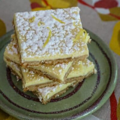 lemon bars on a plate, stacked