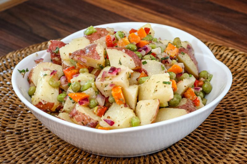 a large bowl of light potato salad