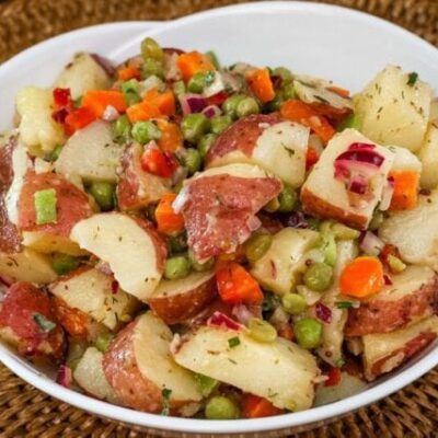 Light potato salad, egg free and dairy free, vegan.