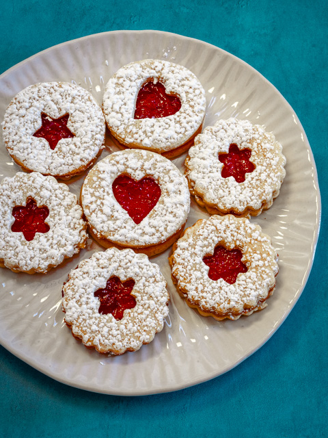 linzer cookies on a plate