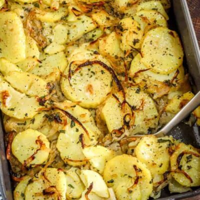 Thinly sliced potatoes baked with herbs and onions.
