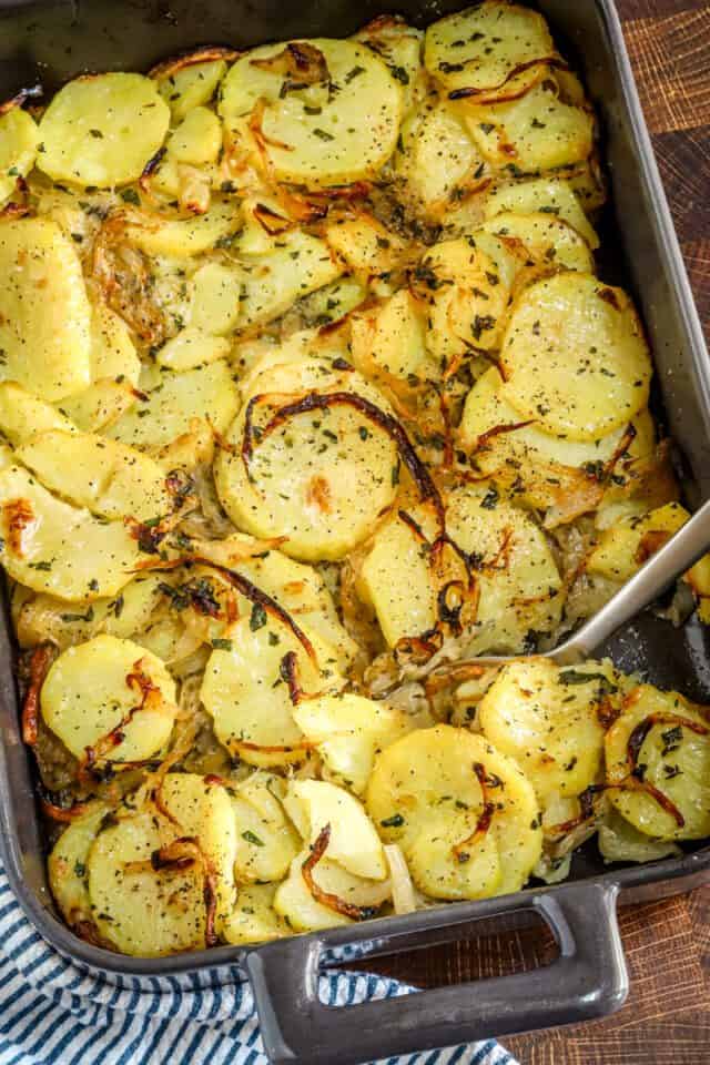 The baked Lyonnaise potatoes are in ready to scoop and serve.