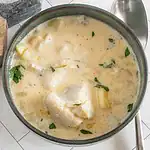 Creamy chicken and vegetable stew with herbs.