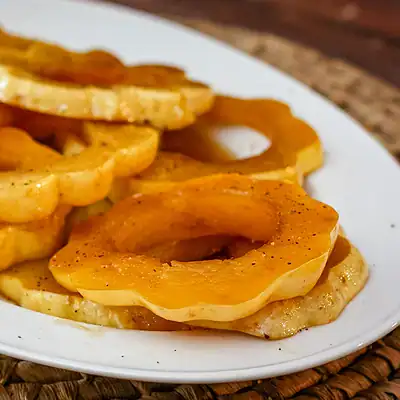glazed squash rings on a platter