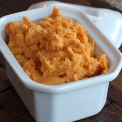 maple mashed sweet potatoes in a serving dish