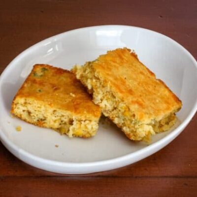 2 slices of mexican cornbread in a dish