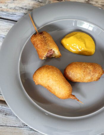 mini corn dogs and yellow mustard