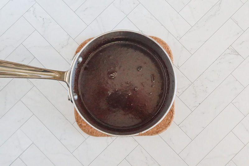 moist chocolate cake preparation, butter, chocolate, and sugars in the saucepan.
