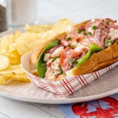 An authentic New England lobster roll in a New England hot dog roll.