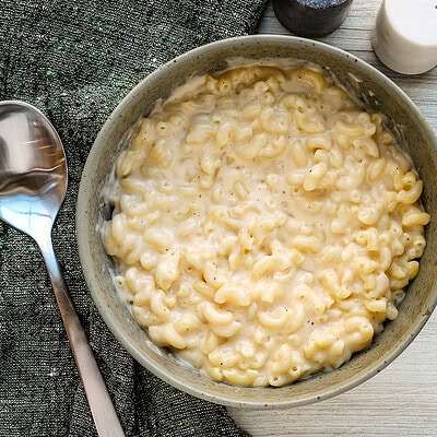 Next level mac and cheese in a serving bowl, ready to enjoy.