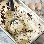 Rich vanilla ice cream with chocolate chunks.