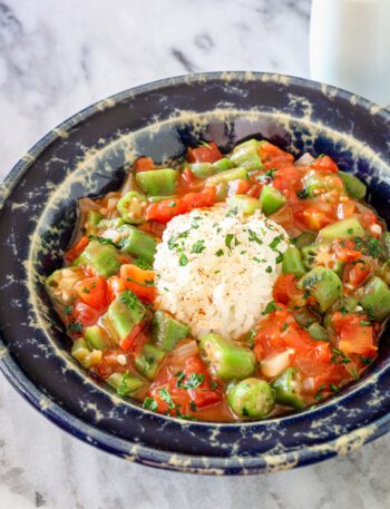 okra and tomatoes with a mound of rice