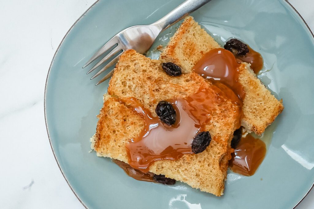 cozy bread and butter pudding with raisins and a caramel sauce