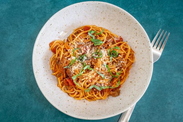 One pot spaghetti dinner, a serving in a wide bowl.