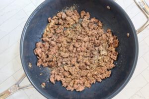 Browning the beef for an easy one pot spaghetti meal.