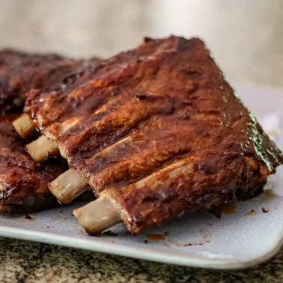 Smoked beef ribs with a rich, smoky glaze.