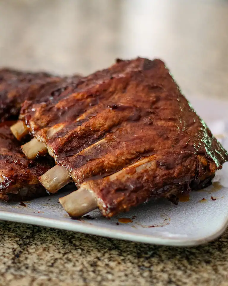 Smoked beef ribs with a rich, smoky glaze.