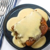 Creamy chicken and gravy over a crispy fried chicken breast.
