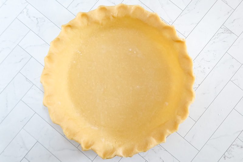 classic Pâte Brisée in a pie plate