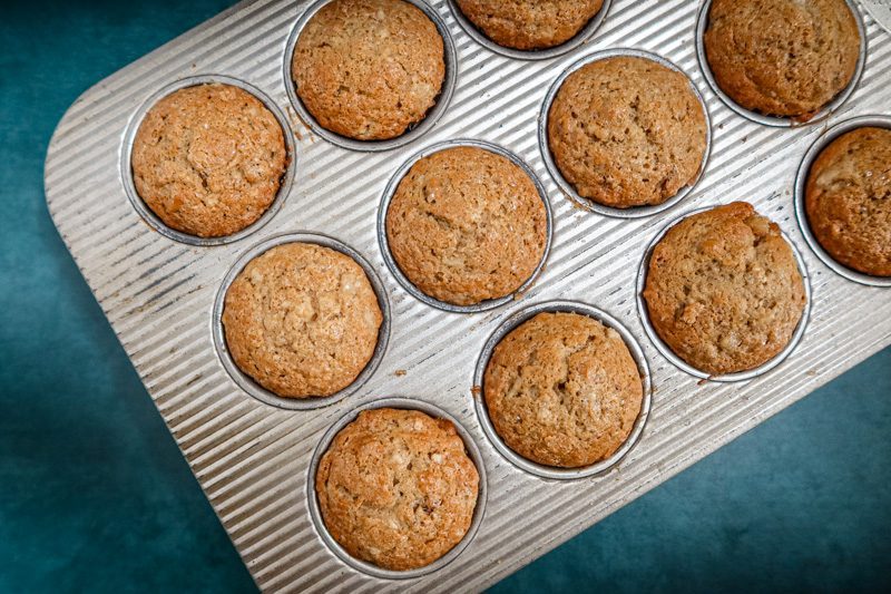 pear muffins baked, in the muffin tin