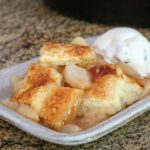 pear pandowdy serving with ice cream on the side