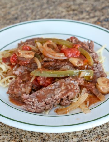 pepper steak strips with tomatoes, onions, and bell peppers.