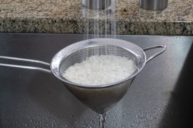 Rinsing rice.