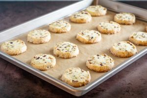 baked pistachio cranberry shortbread on the baking sheet