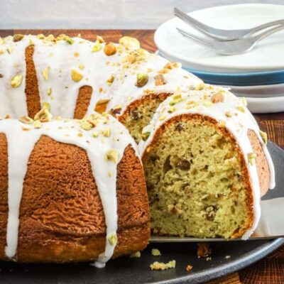 Moist pistachio cake made with a cake mix, pudding, and pistachios.