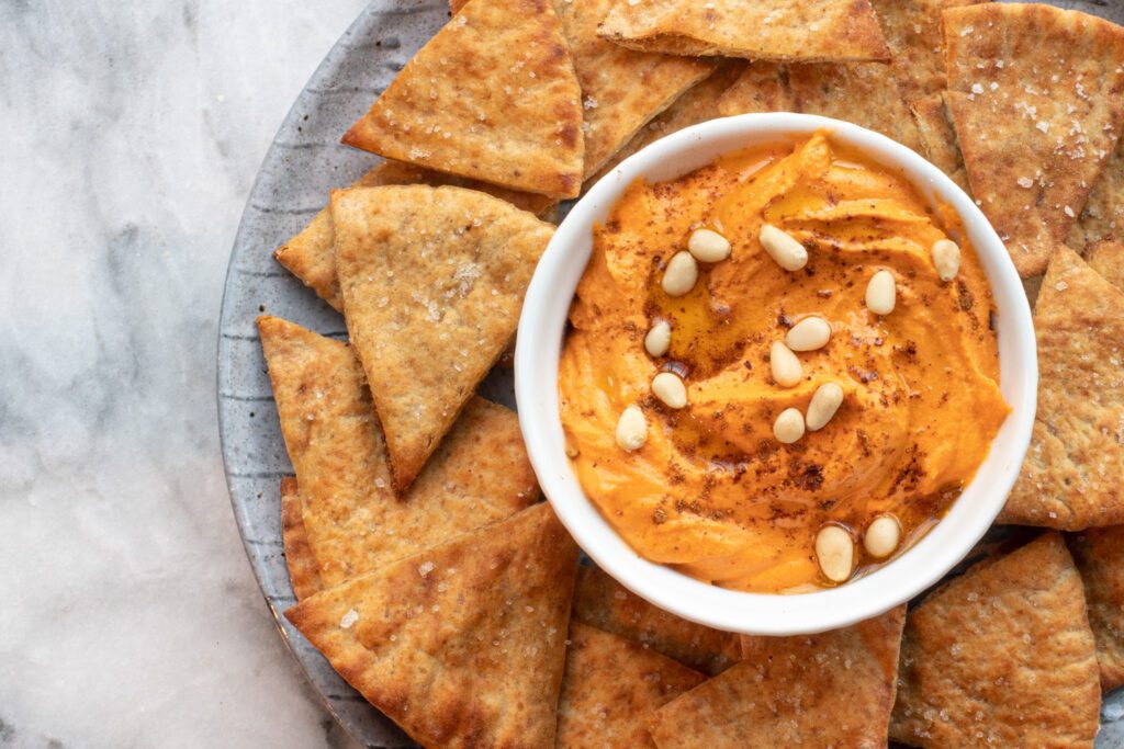 homemade pita chops with dip in the center