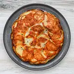 Golden baked scalloped potatoes layered with cheese.