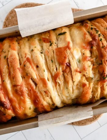cheese and garlic pull apart bread baked with biscuits