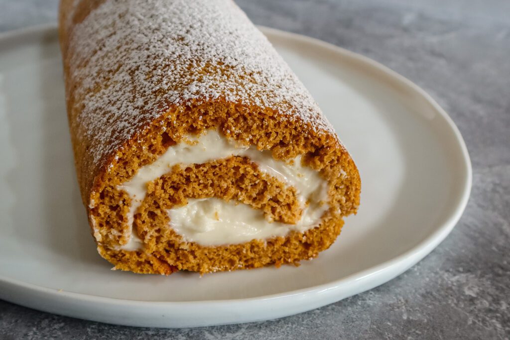 pumpkin cake roll with cream cheese filling