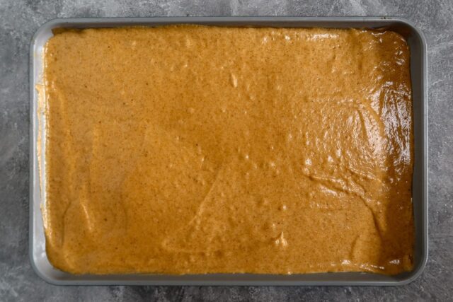 Batter for pumpkin cake in the pan.