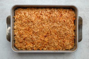 Baked pumpkin cake with coconut pecan topping.