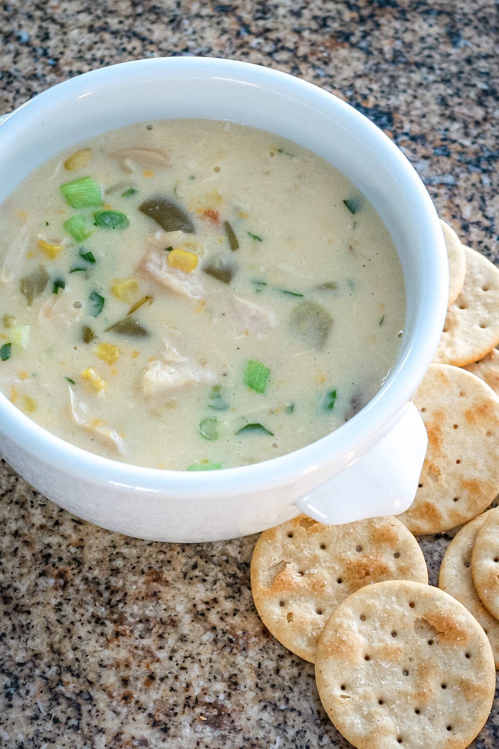 quick chicken chowder in a bowl with crackers