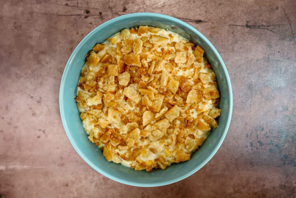 serving bowl with quick scalloped corn with cracker crumb topping