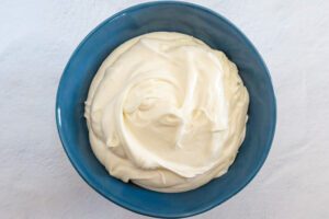 cream cheese frosting in a bowl